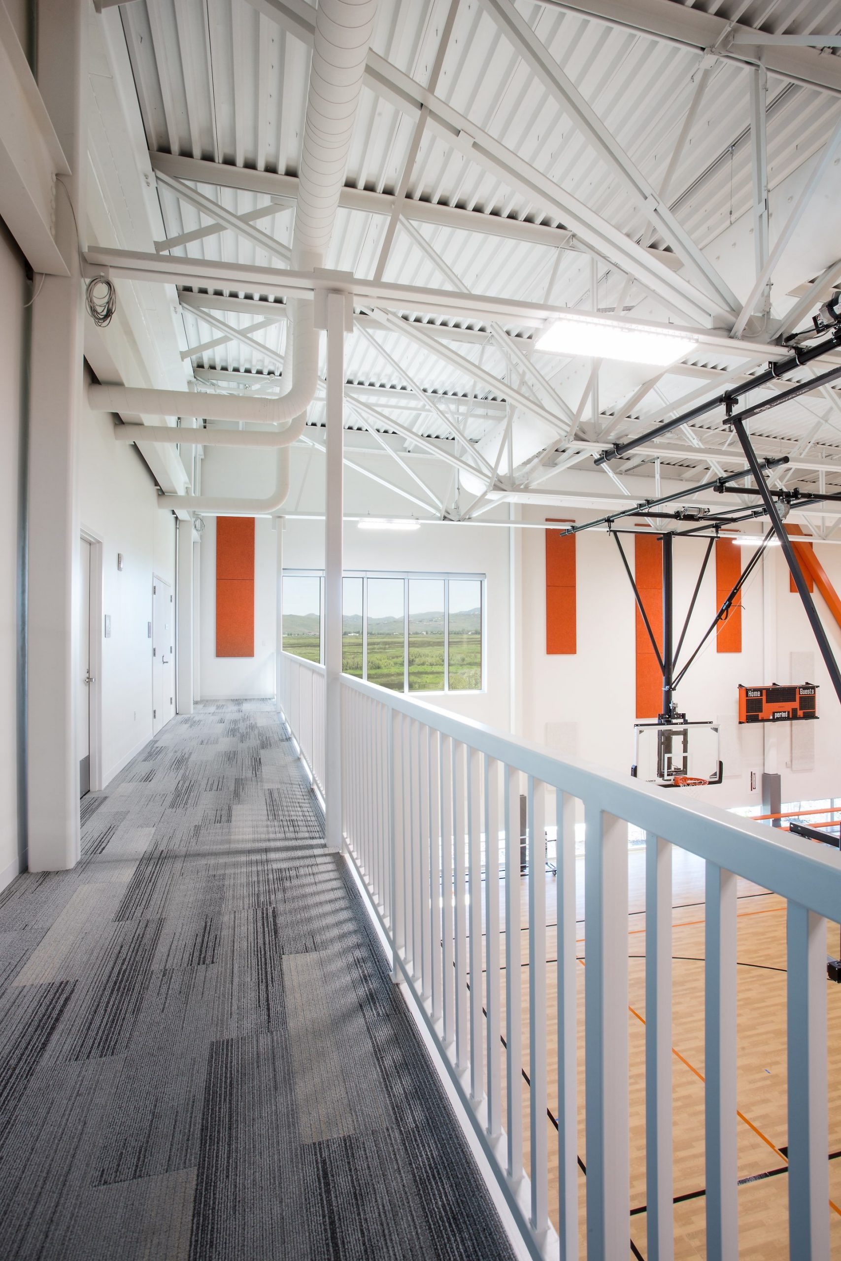 Elevated interior track, Basin Recreation Fieldhouse Expansion, architectural design by Elliott Workgroup