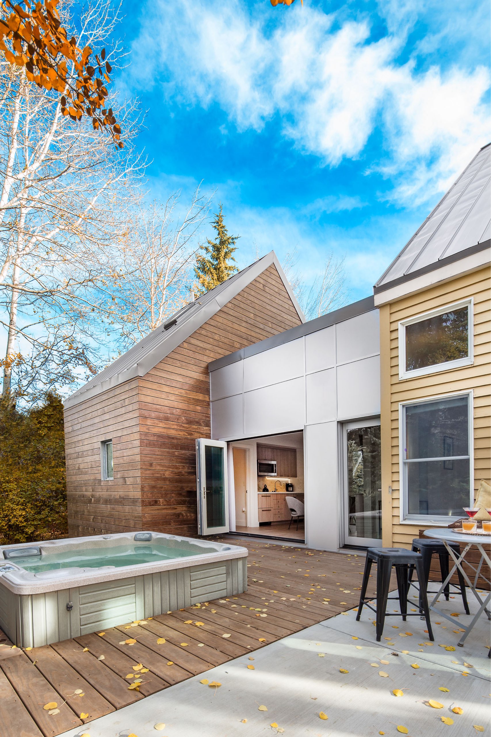 Patio and hot tub at the Granny Pod in Park City, Utah, architectural design by Elliott Workgroup