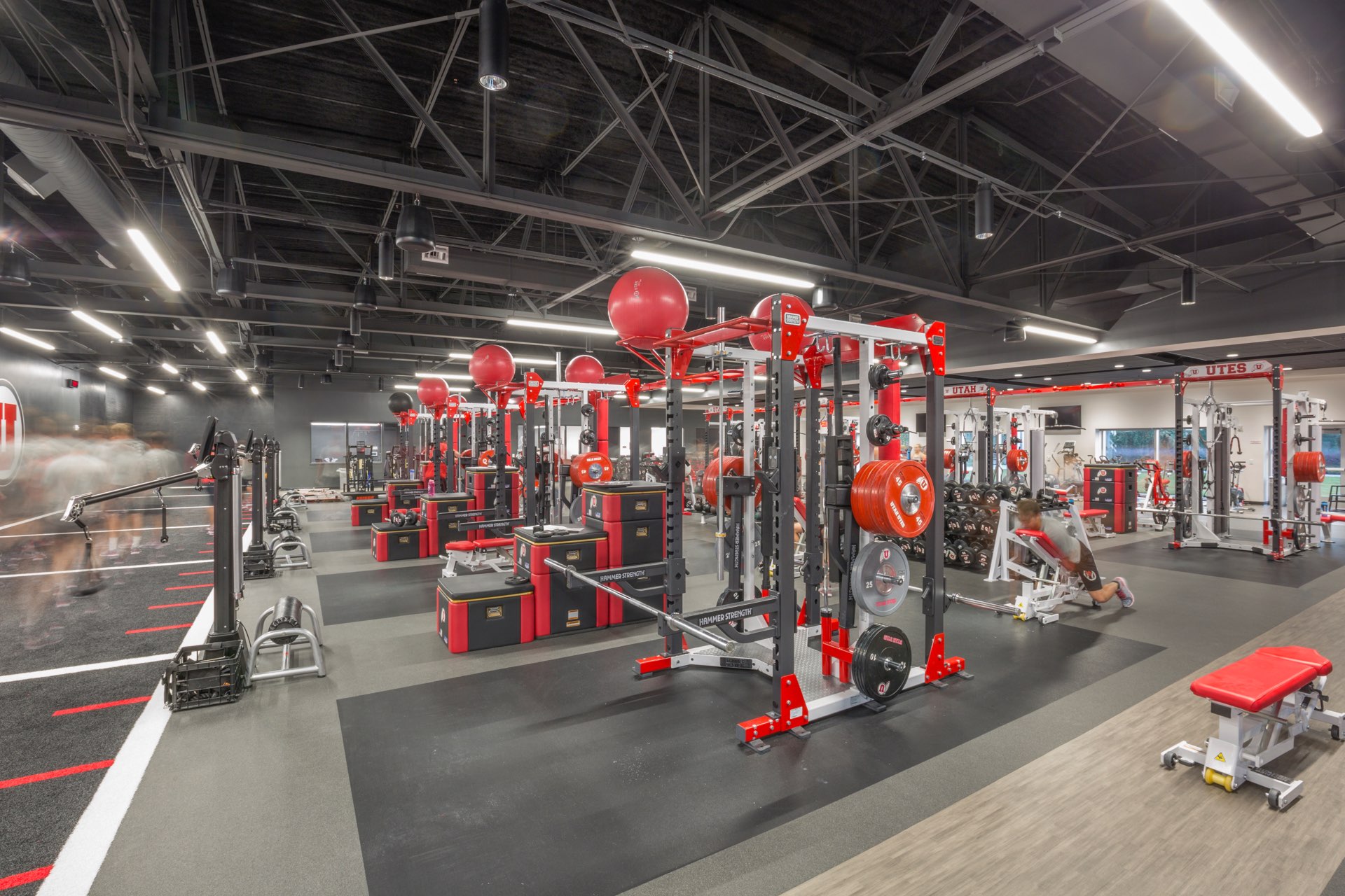 Weight room inside the University of Utah Basketball Interior, interior design by Elliott Workgroup