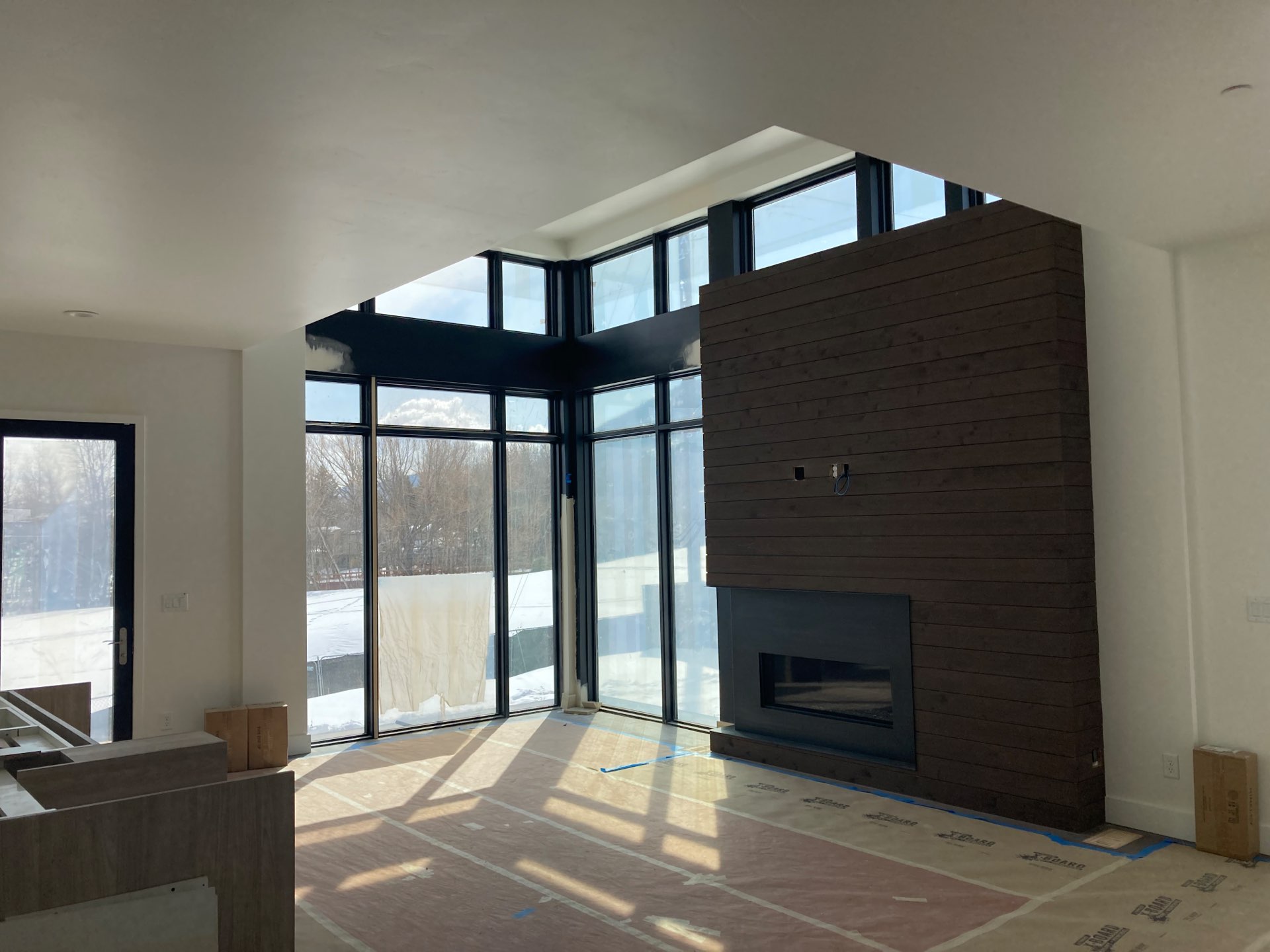 Unfinished living room in Viridian Townhomes at Canyons Village in Park City, Utah, architectural design by Elliott Workgroup