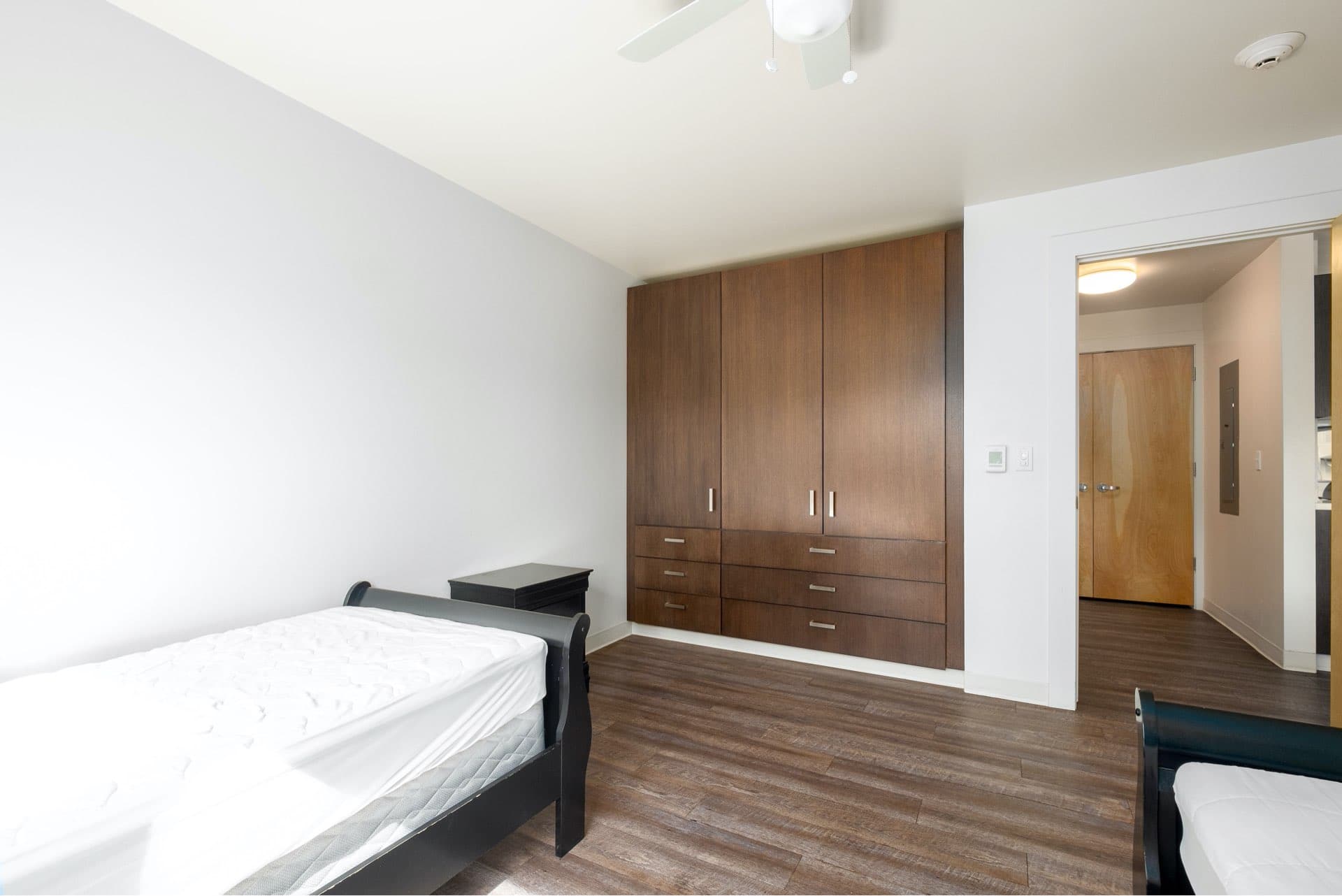 Bedroom, Empire Avenue Workforce Housing, architectural design by Elliott Workgroup